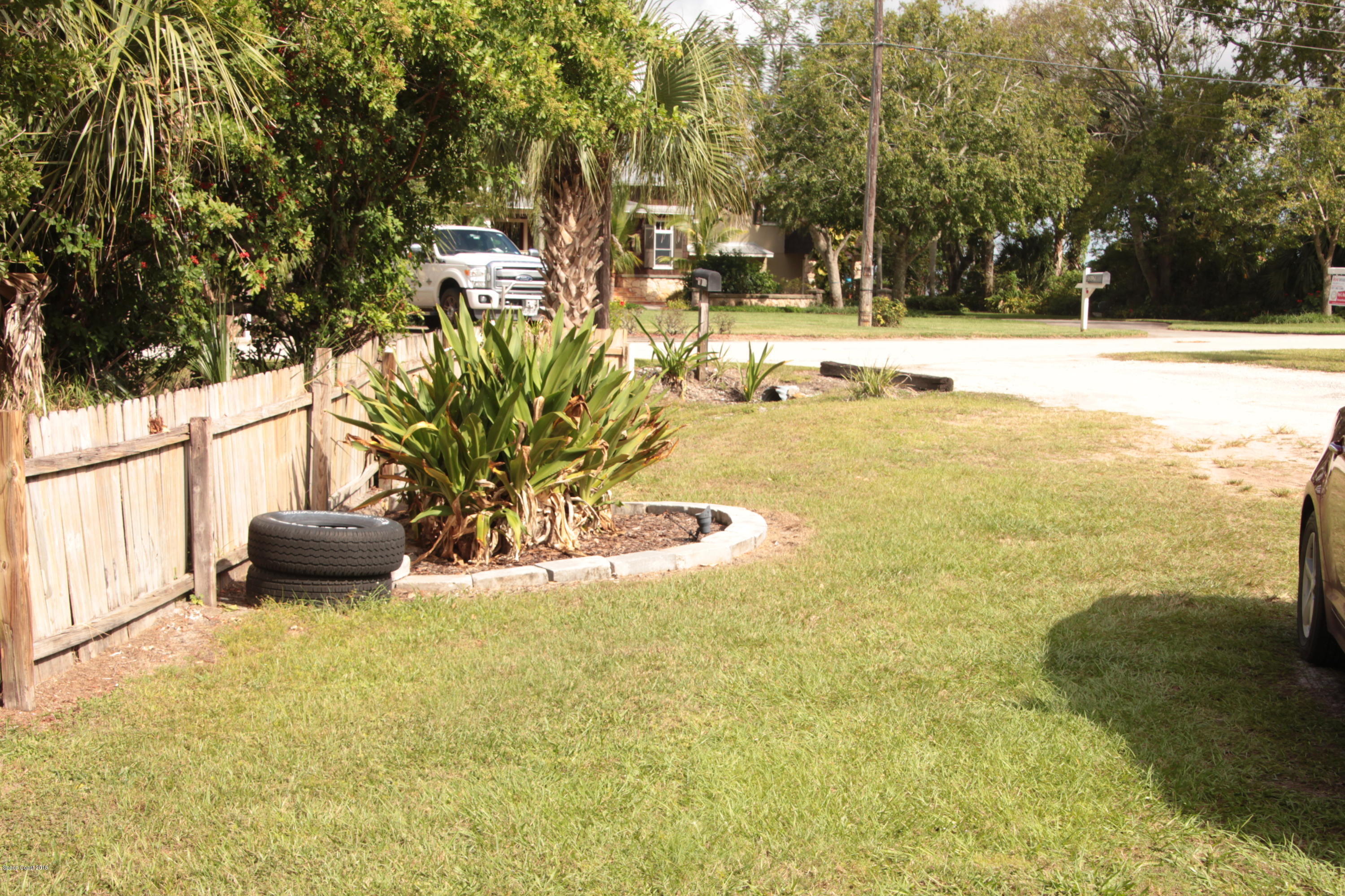 5308 Riveredge Drive Titusville, FL 32780 - Photo 7 of 25 a view of a yard with an outdoor space