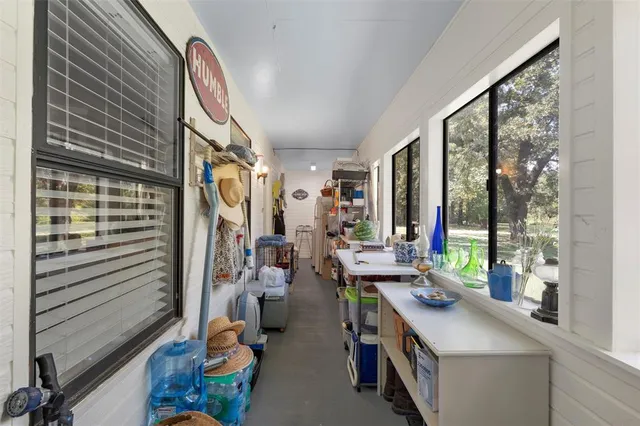a view of a car park in front of a house