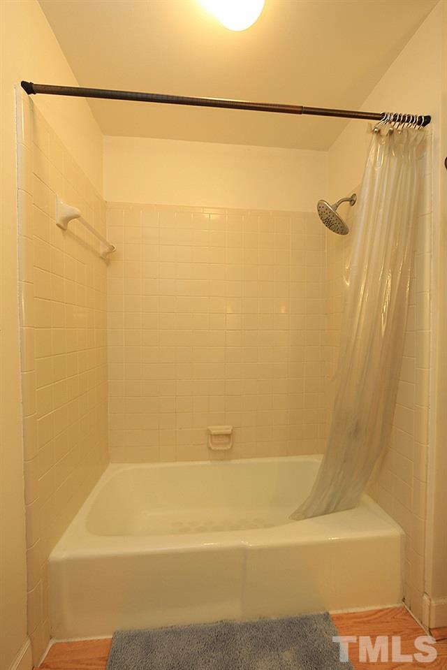 608 Weathergreen Drive Raleigh, NC 27615 - Photo 17 of 25 a bathroom with a shower and a shower