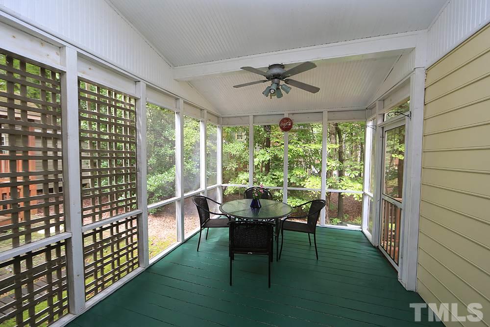 608 Weathergreen Drive Raleigh, NC 27615 - Photo 22 of 25 a view of a porch with furniture and a yard
