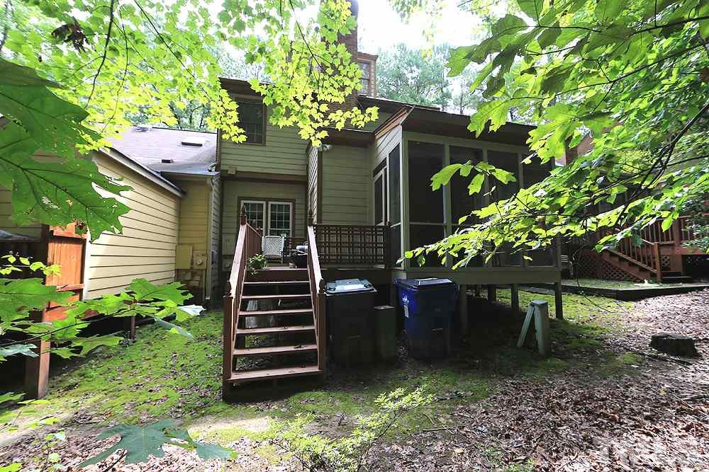 608 Weathergreen Drive Raleigh, NC 27615 - Photo 24 of 25 a backyard of a house with lots of green space