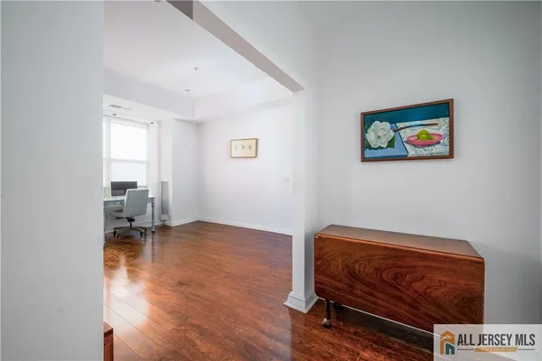 a bedroom with a bed and a chair