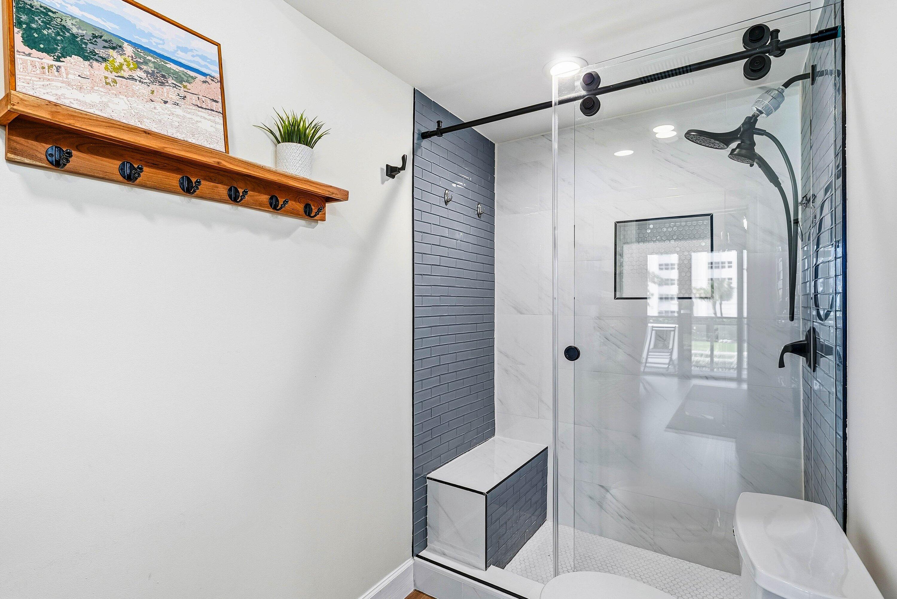 3051 South Ocean Boulevard, Unit 2050 Boca Raton, FL 33432 - Photo 18 of 32 a bathroom with a shower