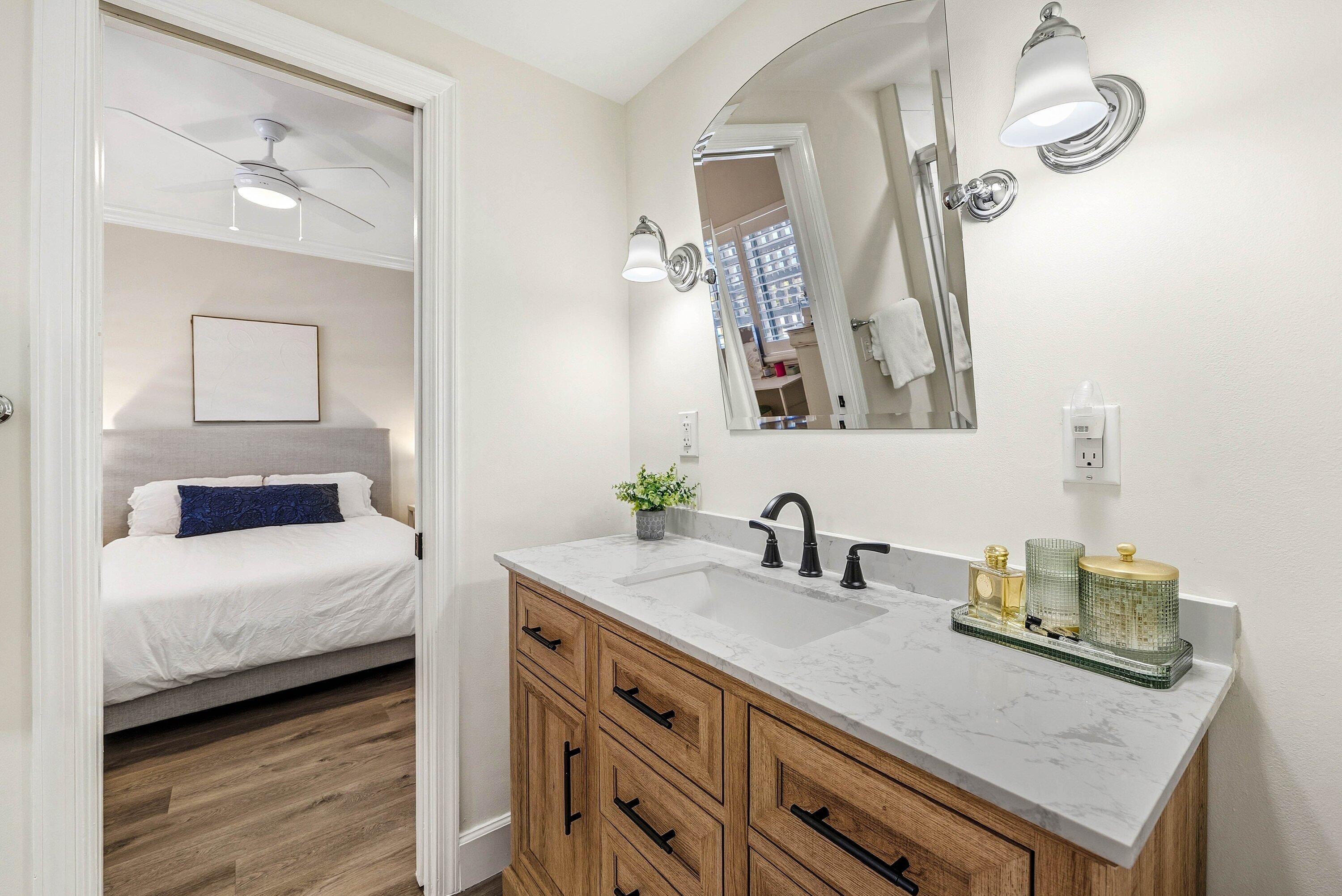 3051 South Ocean Boulevard, Unit 2050 Boca Raton, FL 33432 - Photo 21 of 32 a bathroom with a sink and a mirror