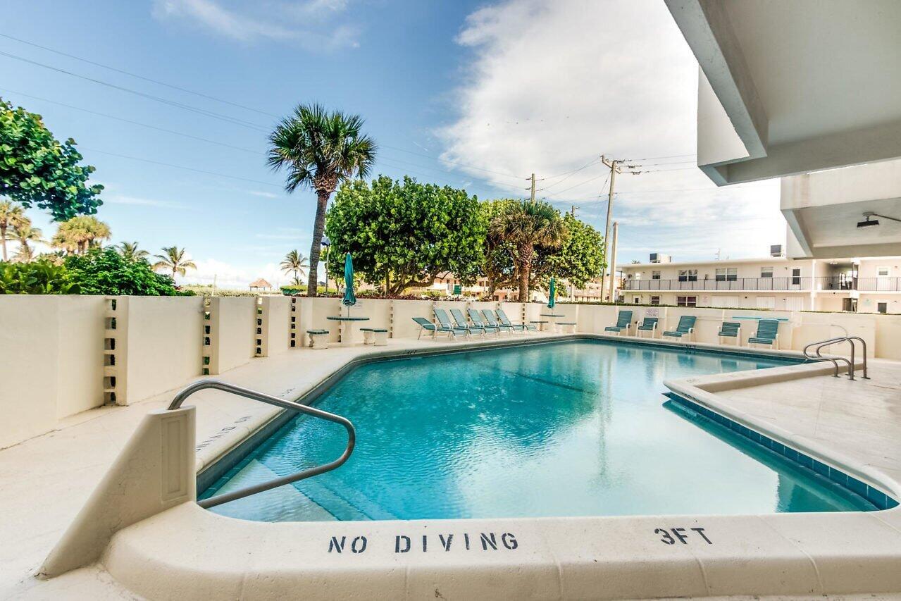 3051 South Ocean Boulevard, Unit 2050 Boca Raton, FL 33432 - Photo 29 of 32 a view of a swimming pool