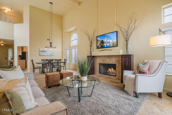 2129 Bermuda Dunes Place Oxnard, CA 93036 - Photo 12 of 42 a living room with furniture and a fireplace