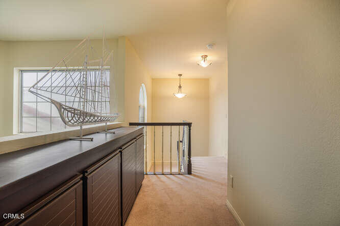 2129 Bermuda Dunes Place Oxnard, CA 93036 - Photo 24 of 42 a kitchen with a sink and a window