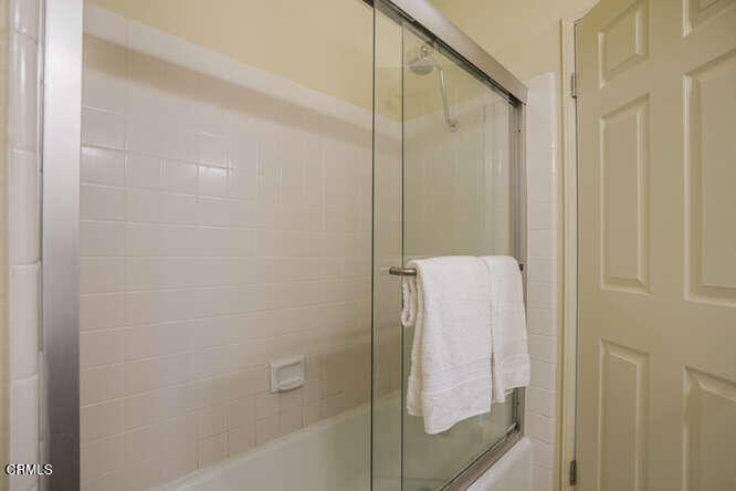 2129 Bermuda Dunes Place Oxnard, CA 93036 - Photo 30 of 42 a bathroom with a glass shower door