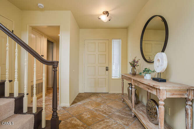 2129 Bermuda Dunes Place Oxnard, CA 93036 - Photo 5 of 42 a view of an entryway with sitting space and hallway