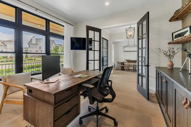 a white stove top oven sitting inside of a kitchen