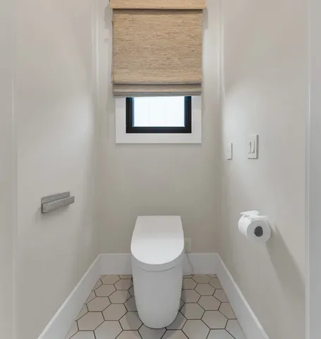 a kitchen with stainless steel appliances a sink a stove and a refrigerator