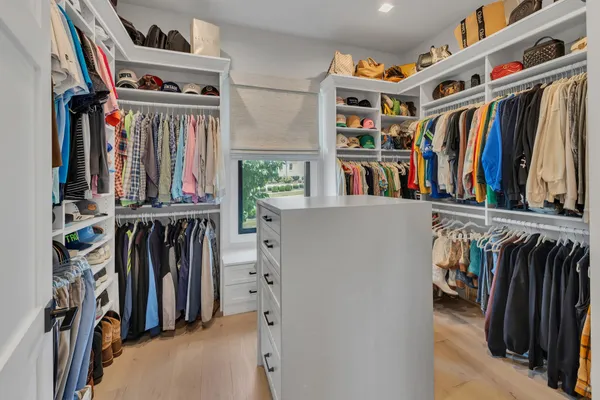 a kitchen with stainless steel appliances a sink and cabinets