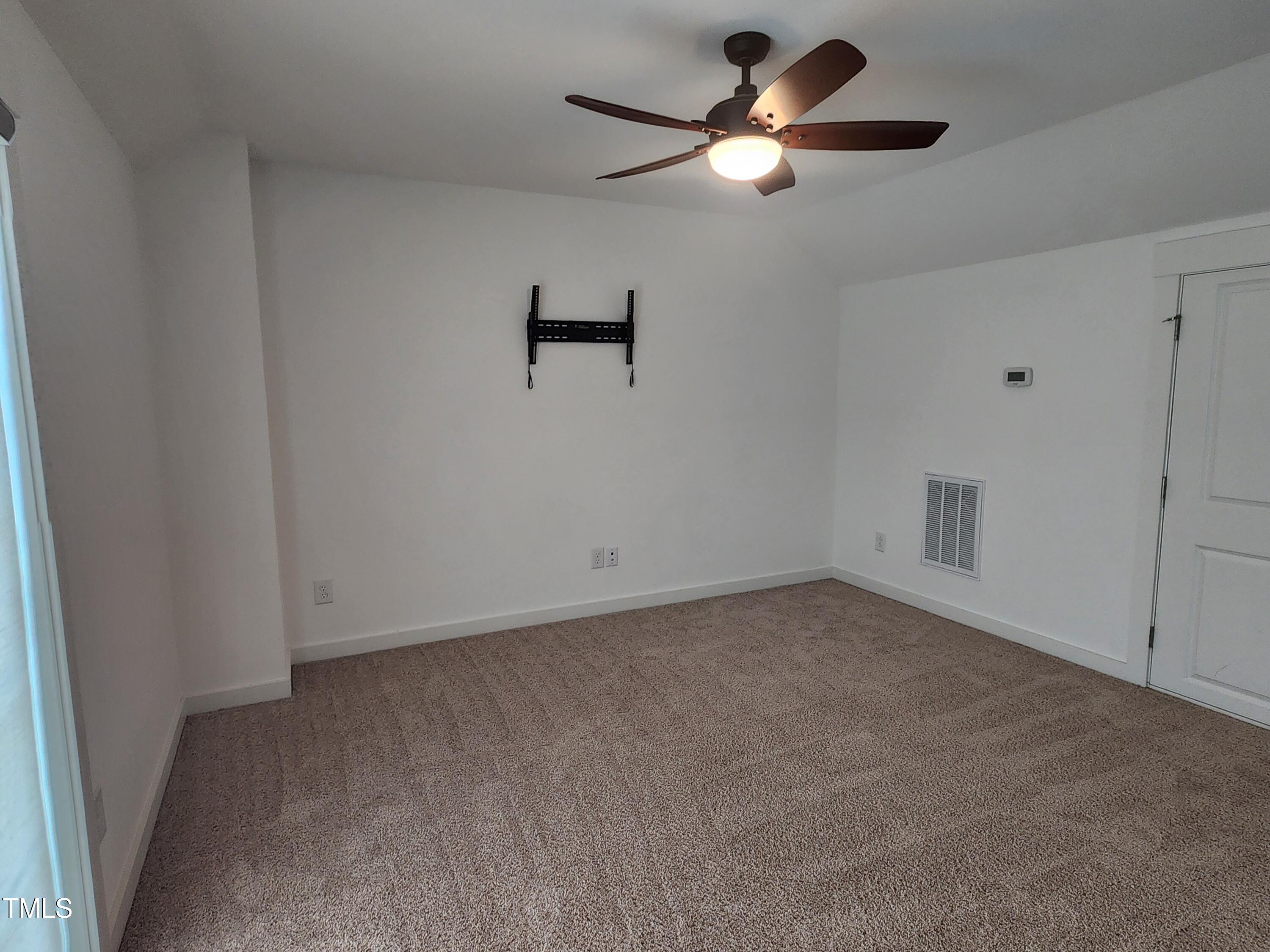 433 Rally Point Place Wake Forest, NC 27587 - Photo 11 of 15 a view of an empty room