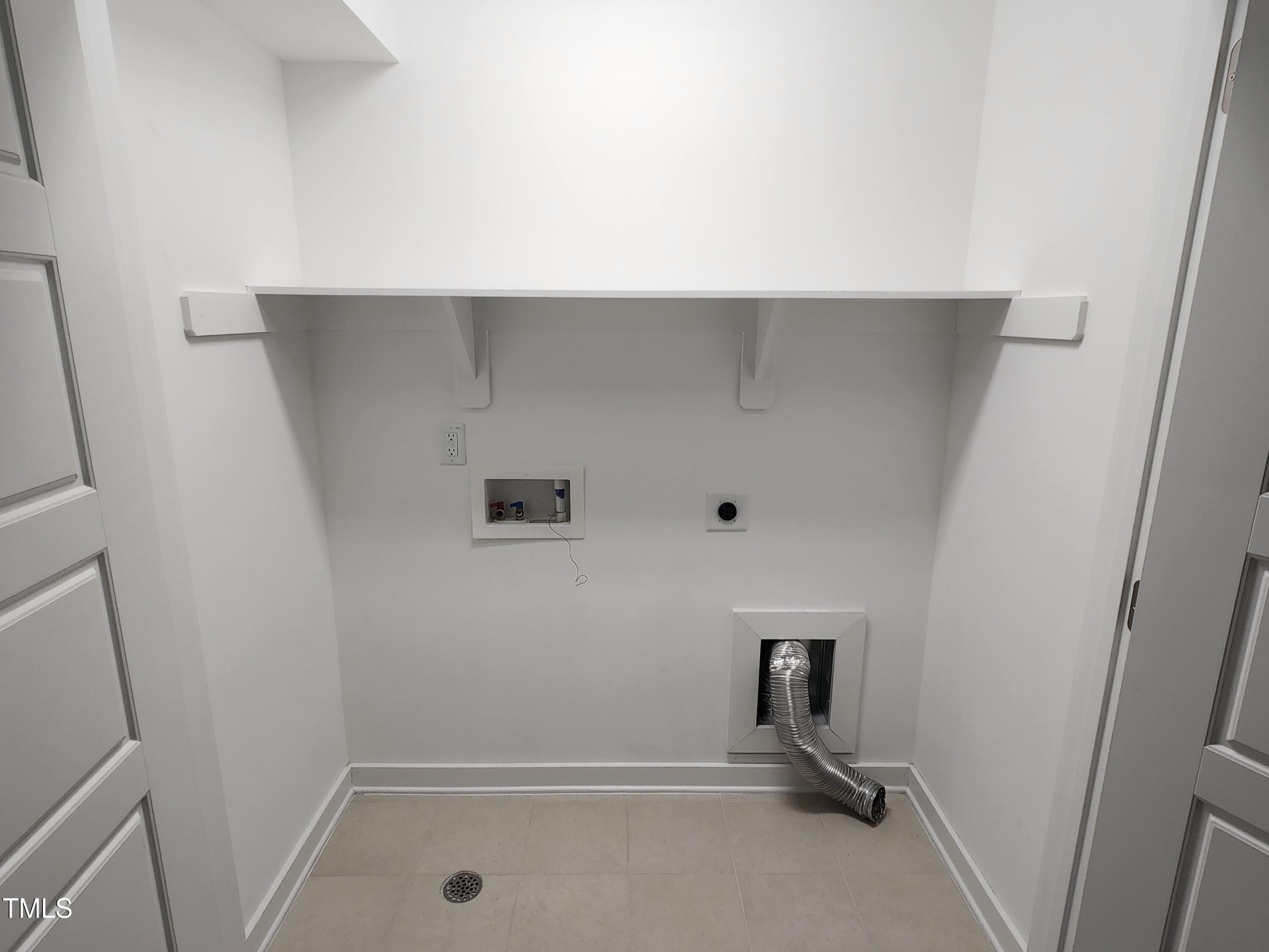 433 Rally Point Place Wake Forest, NC 27587 - Photo 13 of 15 a view of storage and utility room with empty racks