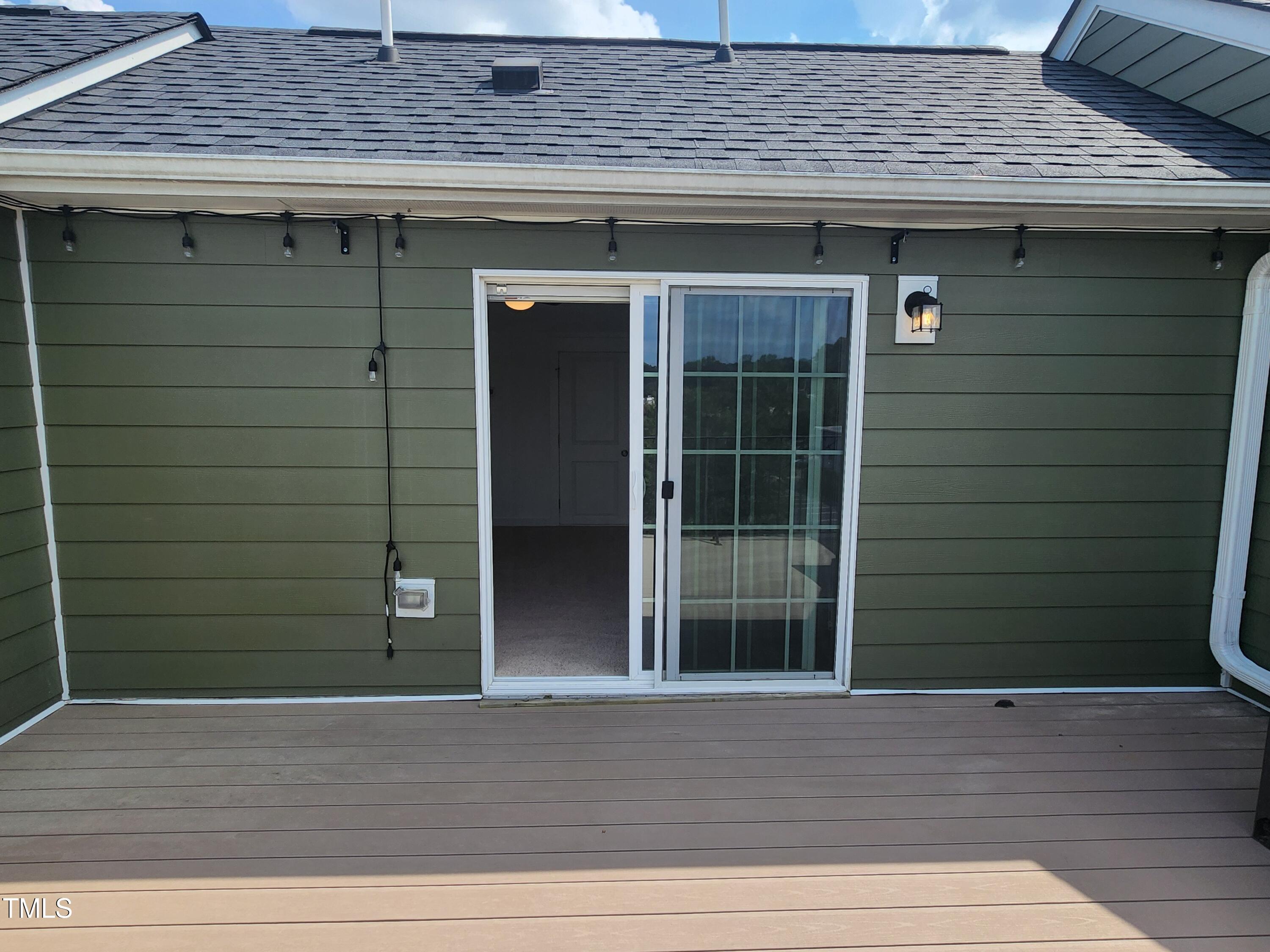 433 Rally Point Place Wake Forest, NC 27587 - Photo 15 of 15 a view of a wooden door of the house