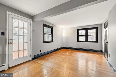 an empty room with windows