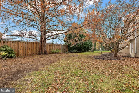 a house with trees in front of it