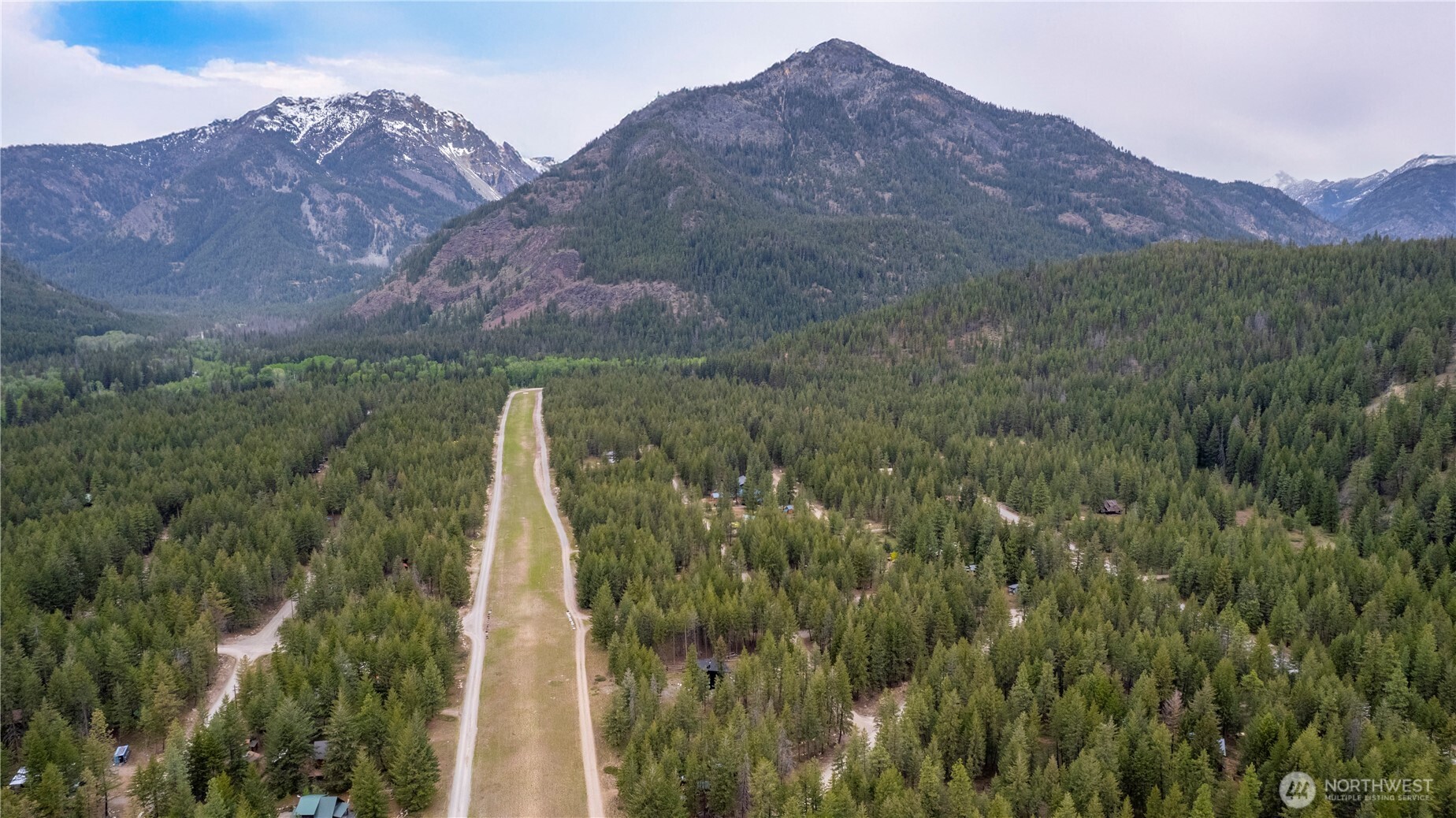 11 Littell Road Mazama, WA 98833 - Photo 15 of 15 a view of a lush green hillside and a mountain