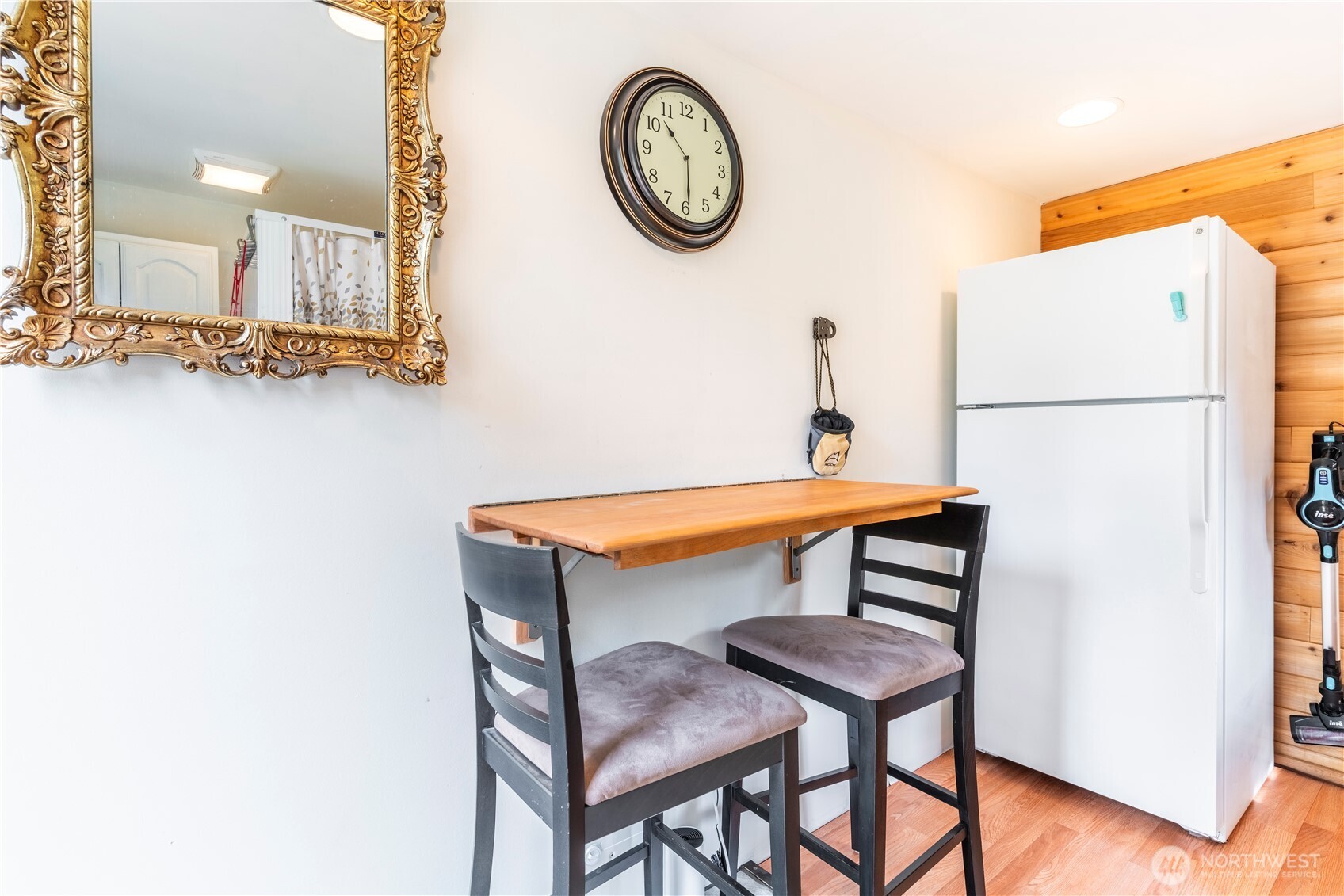 11 Littell Road Mazama, WA 98833 - Photo 9 of 15 a view of a room with a table and a clock