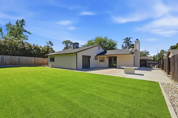 a house view with a garden space