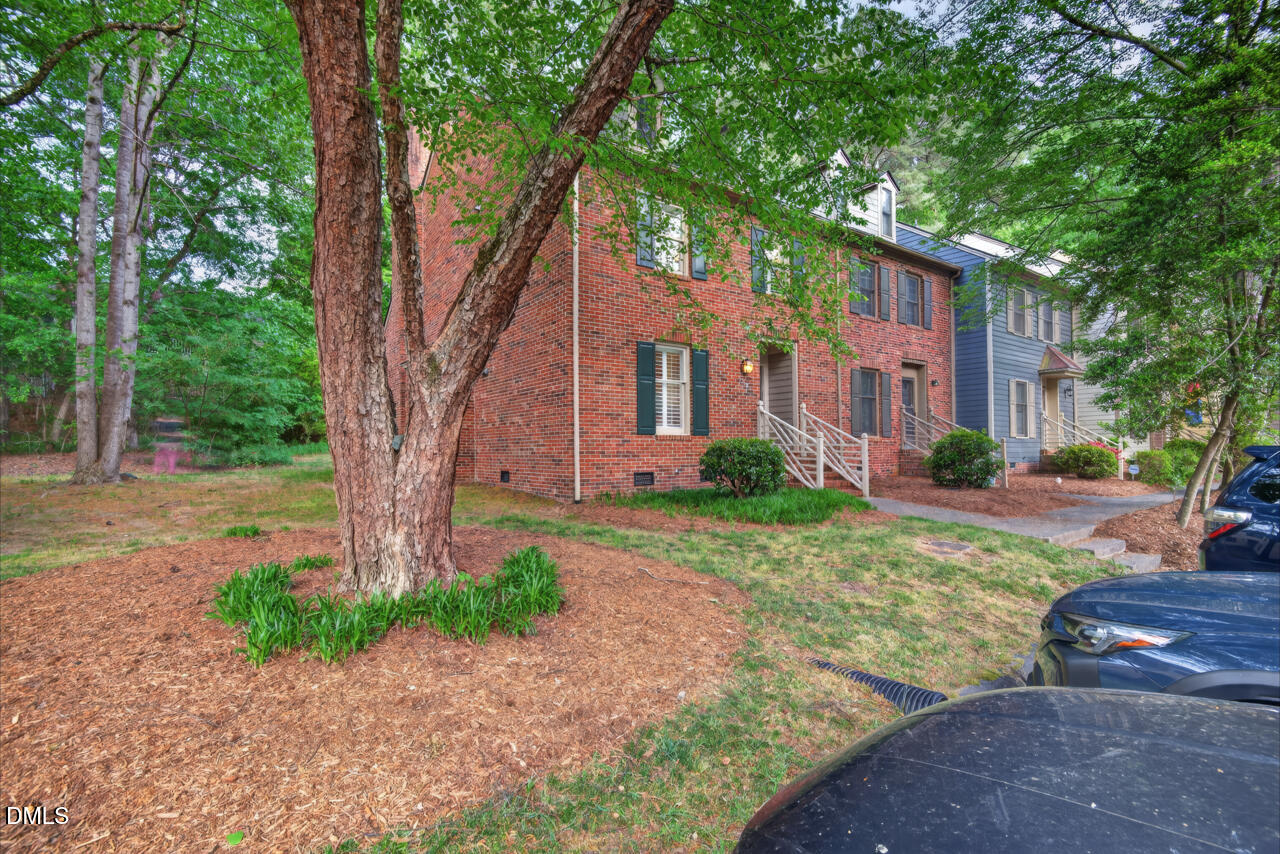 3307 Coachman's Way Durham, NC 27705 - Photo 50 of 50 a front view of a house with garden