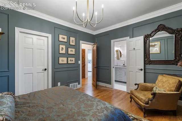 a bedroom with a bed dresser and a window