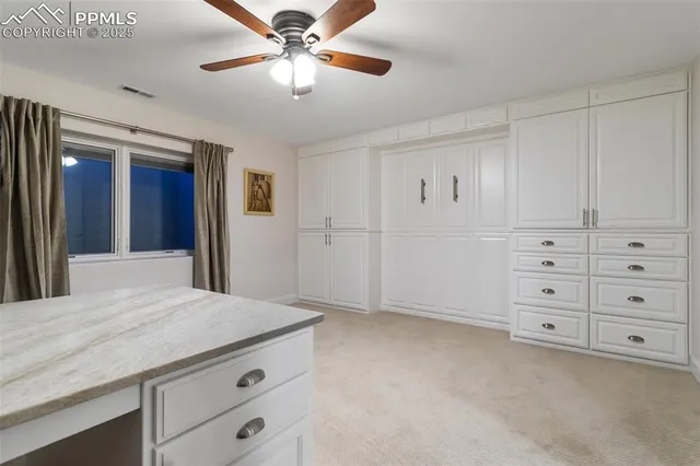 a view of a hallway with closet