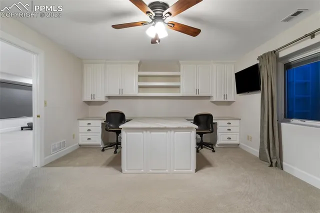 a room with furniture and a flat screen tv