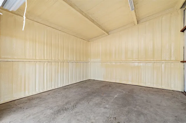 a view of a house with backyard and swimming pool