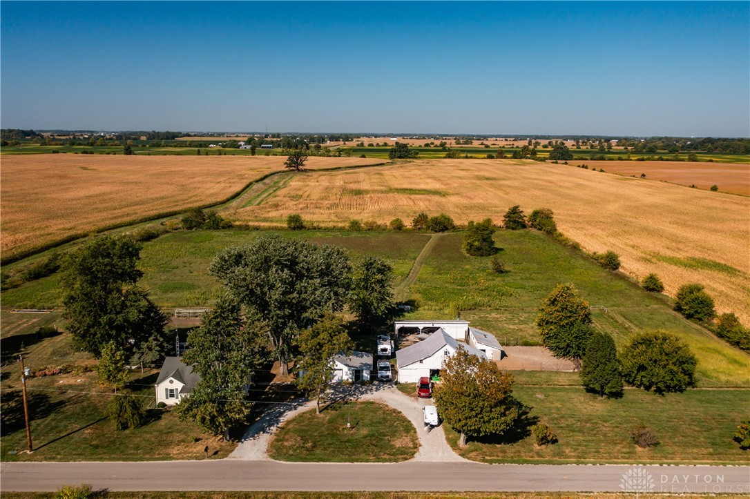 1599 Garringer Road Jamestown, OH 45335 - Photo 2 of 73 Vast fields and green expanses surround this idyllic country home.