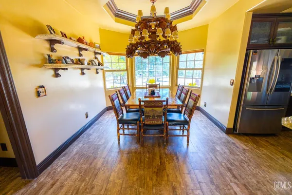 a bed room with a bed and a chair