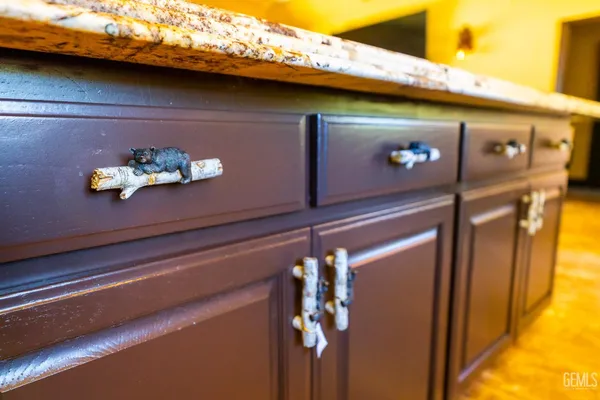 an outdoor sitting area with furniture
