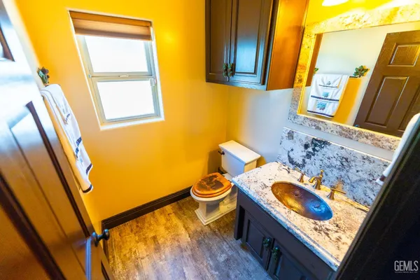 a view of a house with snow on the road