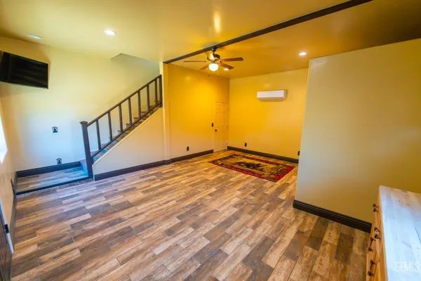 a view of a wooden house with a outdoor space