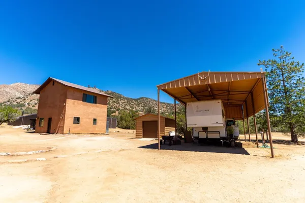 a view of a road with a building in the background