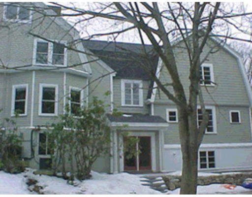 17 Thurston Road, Unit 172 Newton, MA 02464 - Photo 1 of 1 a view of a white house with large tree and windows