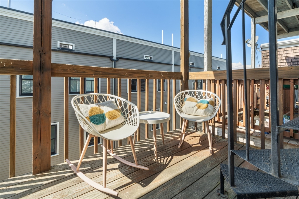 15 I Street, Unit 3 Boston, MA 02127 - Photo 13 of 17 a view of balcony with two chairs and a table