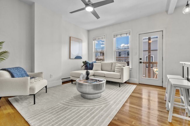 15 I Street, Unit 3 Boston, MA 02127 - Photo 6 of 17 a living room with furniture and a rug