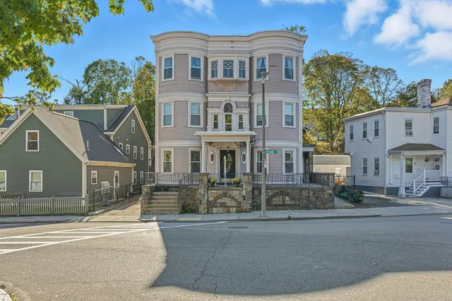 a view of a building with a street