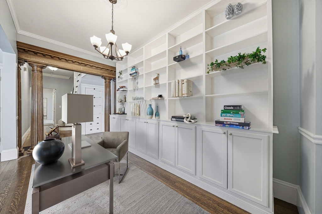 33 Adams Street, Unit 1 Boston, MA 02122 - Photo 15 of 36 a very nice looking dining room with a chandelier