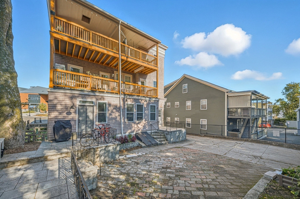33 Adams Street, Unit 1 Boston, MA 02122 - Photo 29 of 36 a view of a building with many windows