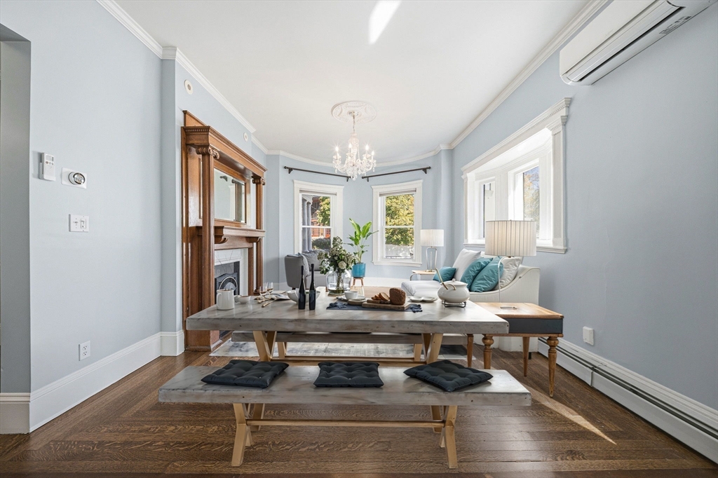 33 Adams Street, Unit 1 Boston, MA 02122 - Photo 7 of 36 a living room with furniture and a potted plant