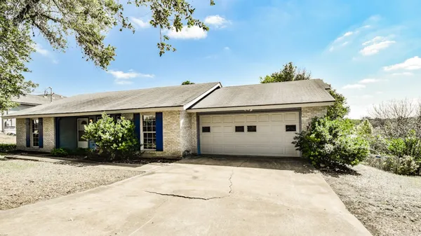 a view of a house with a garage