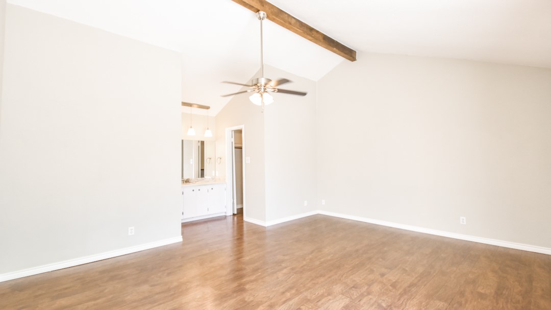 910 Rocky Spring Road Austin, TX 78753 - Photo 14 of 26 a view of a small space with wooden floor