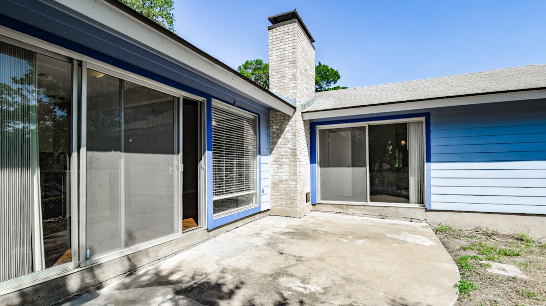 910 Rocky Spring Road Austin, TX 78753 - Photo 23 of 26 a view of a entrance door of the house