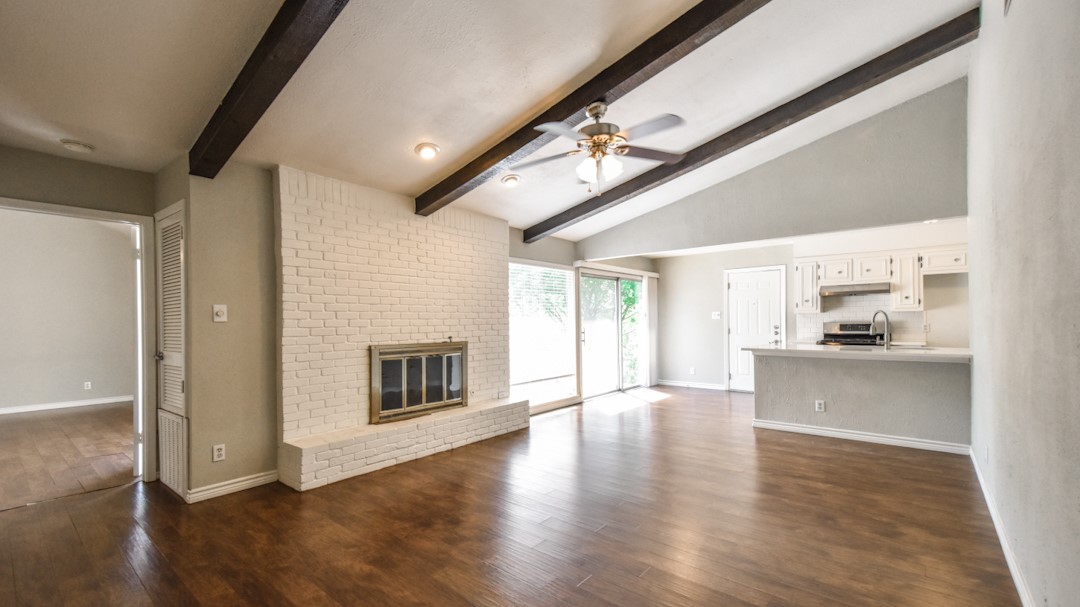 910 Rocky Spring Road Austin, TX 78753 - Photo 8 of 26 a view of a livingroom with wooden floor