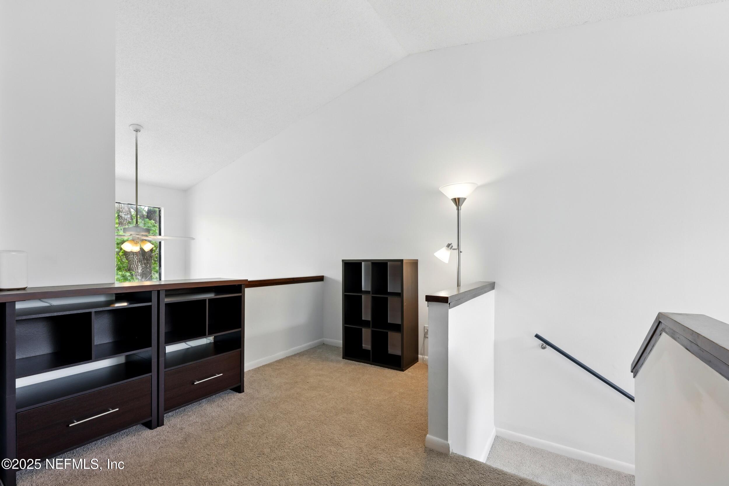 9360 Craven Road, Unit 1406 Jacksonville, FL 32257 - Photo 21 of 30 a view of an empty room with closet