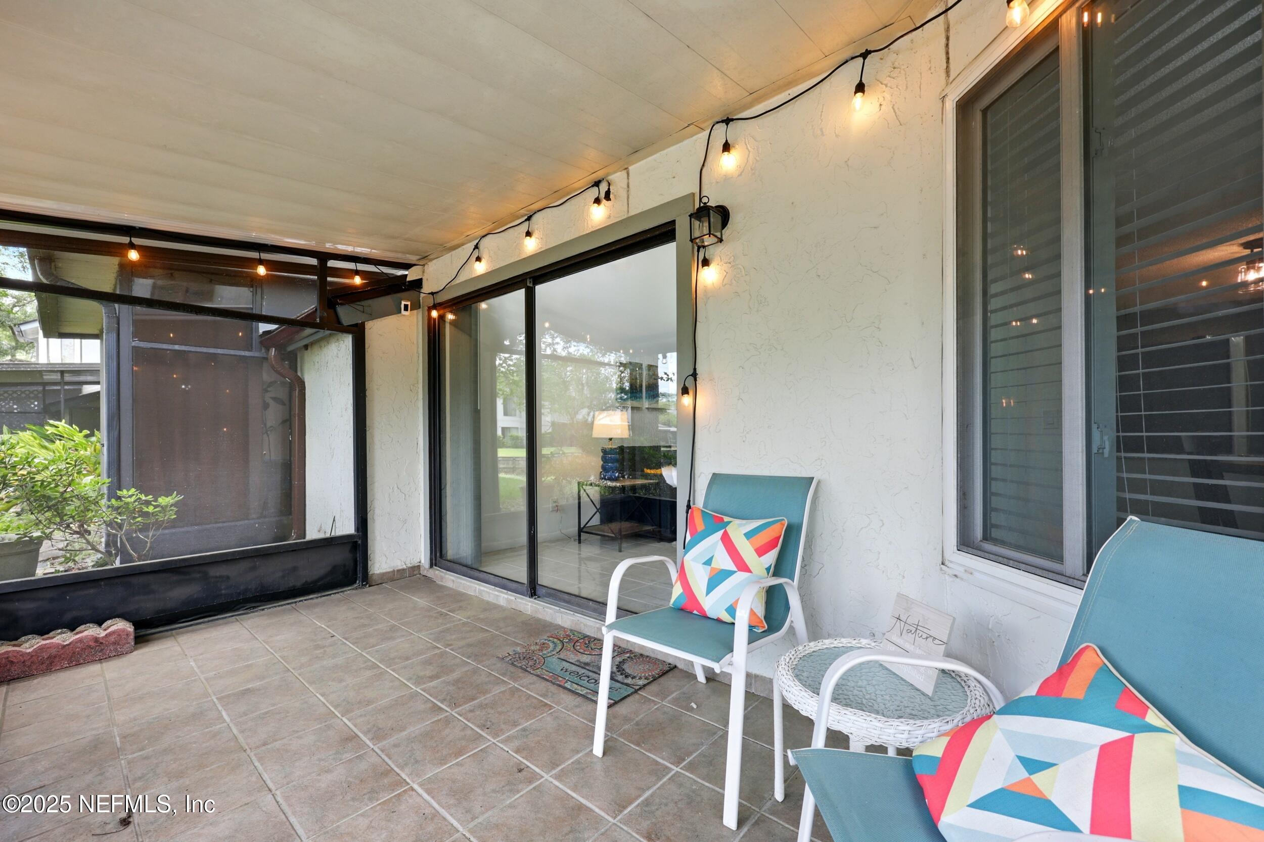 9360 Craven Road, Unit 1406 Jacksonville, FL 32257 - Photo 26 of 30 a view of an outdoor space with seating area