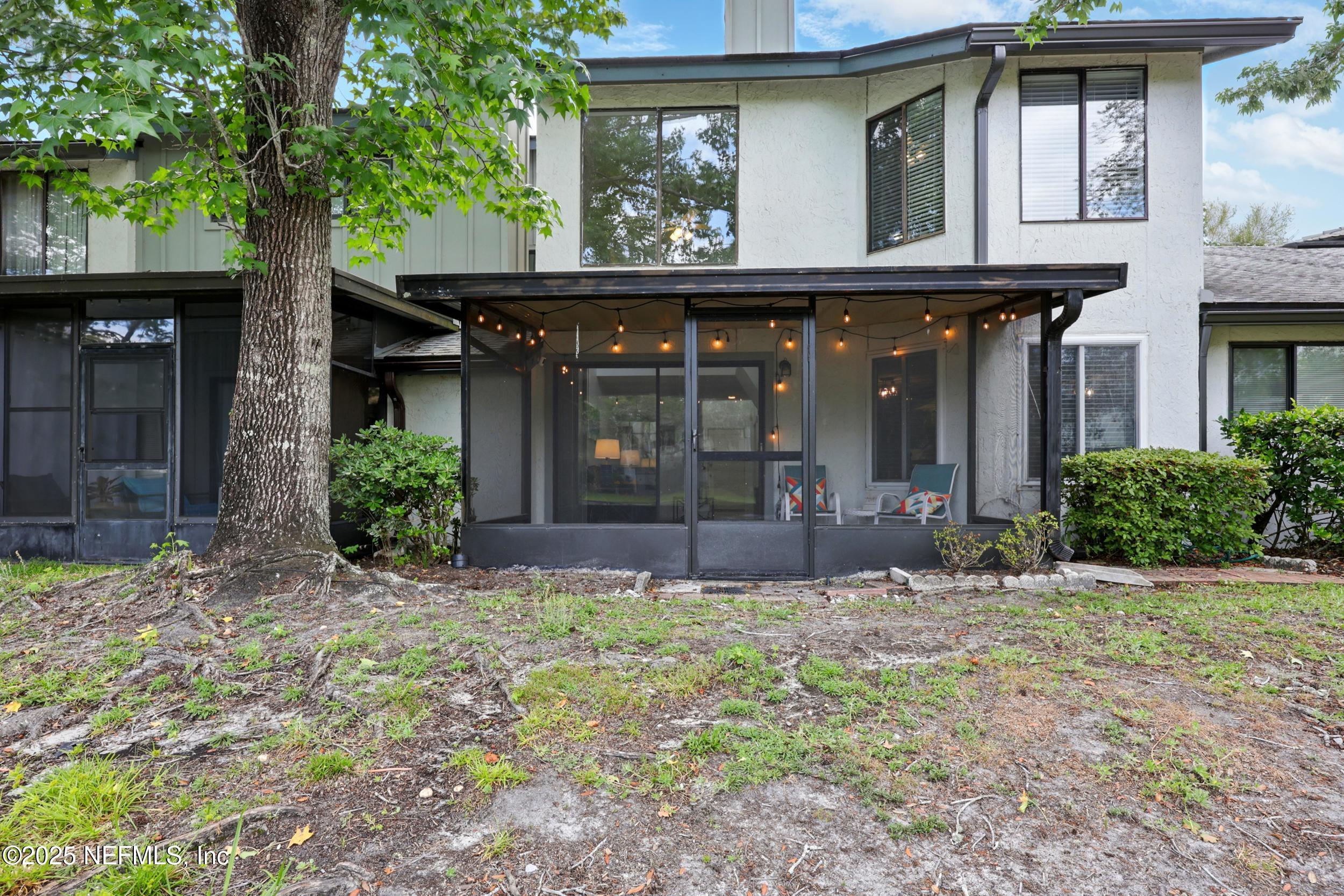 9360 Craven Road, Unit 1406 Jacksonville, FL 32257 - Photo 6 of 30 a view of house with a outdoor space