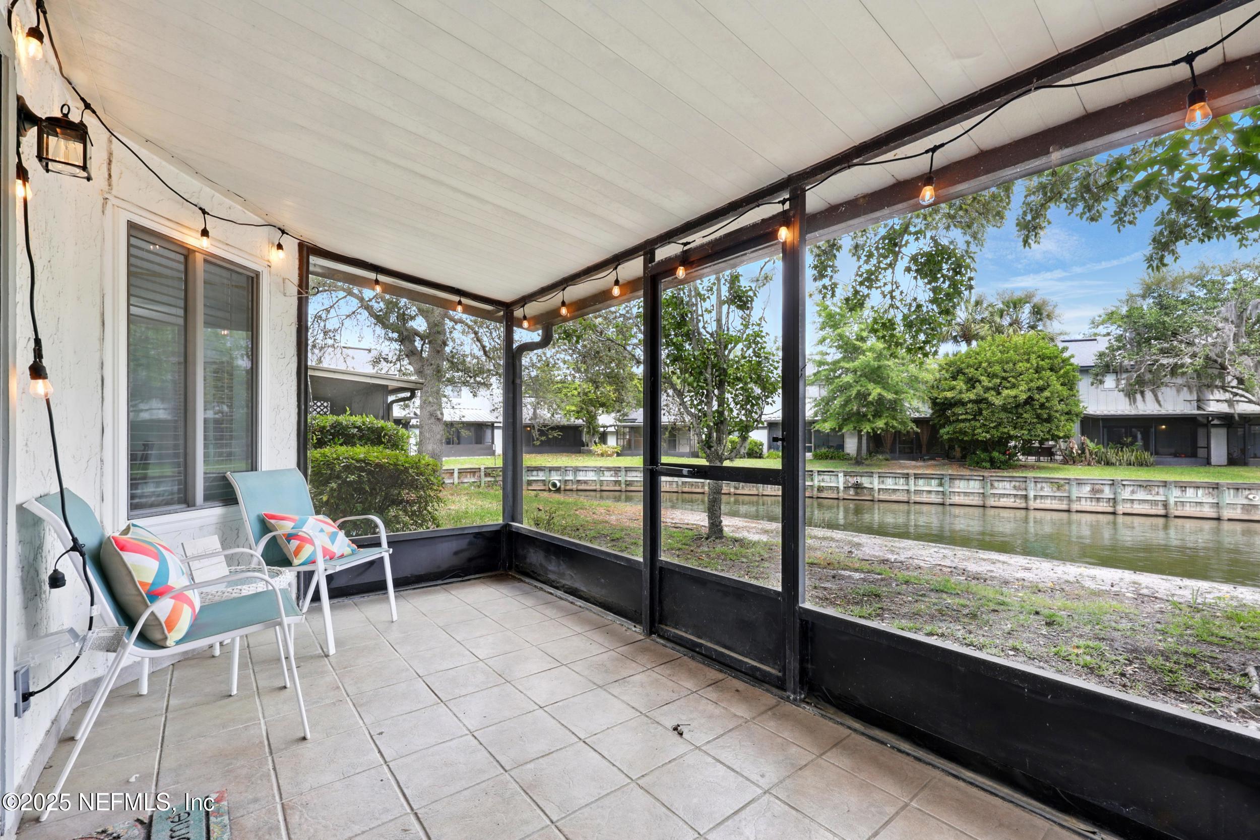 9360 Craven Road, Unit 1406 Jacksonville, FL 32257 - Photo 7 of 30 a building outdoor space with seating area